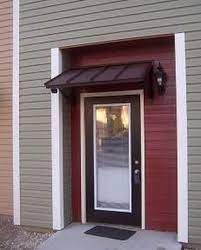 Awningdesign Posted To Instagram Classic Door Awning Bronze With Single S Scroll By Designyourawning Com Awn Door Awnings Metal Door Awning House Awnings