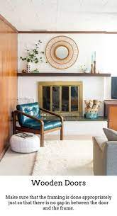 We've since had our fireplace powder coated to prevent future issues, and we keep it covered over the winter. Wooden Doors Timber Doors Are Good If You Reside In A Period Ho Mid Century Modern Living Room Design Living Room Design Modern Mid Century Modern Living Room