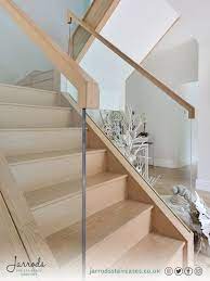 A Contemporary Oak And Glass Staircase With A Galleried Landing That Was In Keeping With The Newly Renov Staircase Design Glass Staircase Glass Railing Stairs