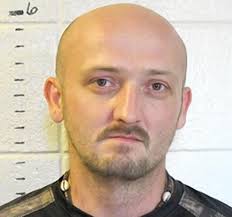 Jail escapee captured; sheriffs' deputy fired