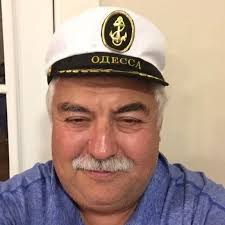 I need some suggestions from experts . Apart from stix from benjamin moore,  what will be best primer for these cabinets(looks like laminate cabinets) I  am in Vancouver Canada