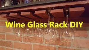 Drill pilot holes through the wine glass rack before attaching it to the shelf. Wine Glass Rack Diy Youtube