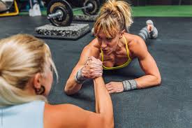 arm wrestling challenge between women