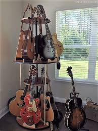 The Carousel Deluxe Rotating Multi Guitar Stand Guitar Stand Guitar Stand Wall Multiple Guitar Stand