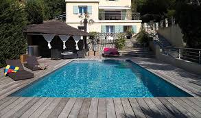 Le Bois Autour De La Piscine Pour Une Touche De Naturel Desjoyaux Piscine Piscines Desjoyauxpools Labouti Construire Un Pont Piscine Rectangulaire Piscine