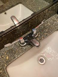 Do we need to cut some of the sink material off (underneath, where the drain assembly is inserted from below)? Bathroom Sink Faucets Why Do They Make The Neck So Short Mildlyinfuriating