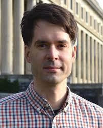 Electrolyte versus Dielectric Gating of Two-Dimensional Materials