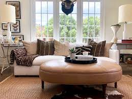 The unique design of the avery oval leather storage coffee table ottoman provides a convenient serving area, storage space, and additional seating all in one. Modern Transitional Leather Oval Ottoman Coffee Table With Wooden Turned Legs At 1stdibs