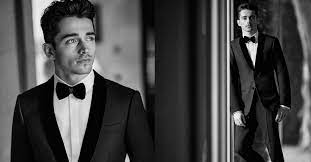 Lo sportivo monegasco è protagonista, per la prima volta. Video Giorgio Armani Ambassador Charles Leclerc Embodies Elegance Of Bespoke Tailoring