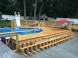 If you have an above ground pool, placing a deck around it is an excellent idea for many reasons. Building A Pool Deck Regan Total Construction