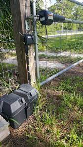 How Do You Install A Drive Gate With Automatic Opener Farm Fence Backyard Fences Fence Landscaping