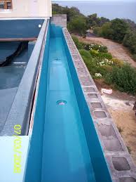 Endless pools and swim spas are available in a number of different price brackets. How Much Does An Infinity Edge Swimming Pool Cost Compass Pools Melbourne