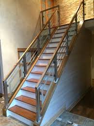 Custom Stainless Steel Glass Railing With Etching Glass Fabricated And Installed By Capozzoli Stairworks Railing Design Staircase Railing Design Glass Stairs