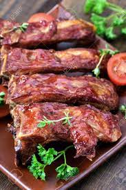 Costillas De Cerdo A La Plancha Sobre Placa De Ceramica Profundidad De Campo Fotos Retratos Imagenes Y Fotografia De Archivo Libres De Derecho Image 45661458