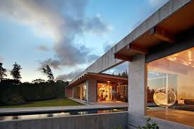 A huge carport with concrete driveway and sidewalks allow for easy maintenance. Concrete Home Built On Hawaiian Lava Flow Architect Magazine