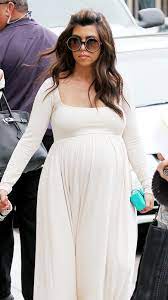 Kourtney Kardashian Shows Off Baby Bump In Black Bikini Instyle