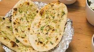 Garlic Naans Recipe In Tawa Eggless Naan Recipe Without Oven And Tandoor Naan Recipe Tandoori Naan Recipe Indian Food Recipes