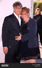 The new adventures of superman.' apart from her own fame, she is also known as eric roberts's wife.eliza was born to father david rayfiel and mother, lila garrett. Eric Roberts Eliza Image Photo Free Trial Bigstock