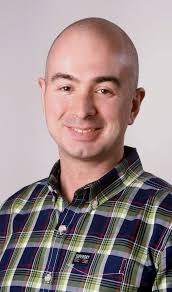 A Cost and Power Feasibility Analysis of Quantum Annealing for NextG  Cellular Wireless Networks