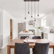 Linear Staggered Glass Dining Room Lights Design Ideas