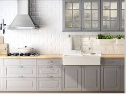 A tuxedo kitchen with gray lowers and white uppers (lindigo cabinets). Pin By Tran Nhu Trang On Updating Kitchen Design Grey Kitchen Cabinets Light Grey Kitchen Cabinets