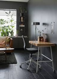 A standard, white ikea desk was transformed using gold spray paint on the desk legs and gold drawer pull handles. Keeping Things Slim And Sustainable Home Office Furniture Home Office Design Home Office Desks