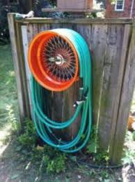10 Creative Garden Hose Storage Ideas Garden Hose Storage Hose Storage Garden Hose Holder