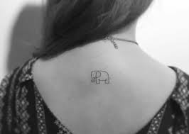 Small back tattoos with flowers. Small One Color Elephant On The Back Tattoo Pictures Tattoo Pictures