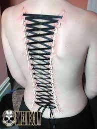 A Corset Piercing That Looks So Painful Corset Piercings Body Piercings Piercings