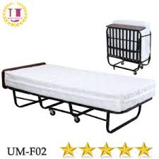 It slides under an existing bed to keep the room looking neat and tidy. China Hotel Guest Room Single Folding Metal Bed With Wheels China Folding Bed Extra Bed