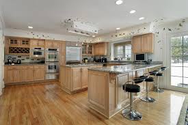 In kitchen terms, a peninsula is similar to an island in that it's a unit with a worktop, but instead of standing free in the middle of your kitchen, one end is attached to the wall. Kitchen Island Or Peninsula A Complete Design Guide