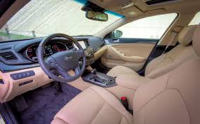 The 2014 Kia Cadenza Features An Interior That Radiates An Uncluttered And Sophisticated Aesthetic Featuring Beige With Leather Seat Tr Kia Sedan Blue Interior