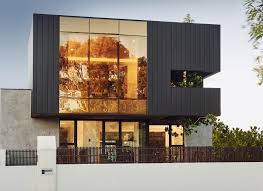 Maybe you would like to learn more about one of these? A Dark Grey Color Palette Is Consistently Found Inside And Outside This Modern House
