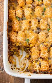 Cover with the meat mixture with cheese, then line up the tater tots on top in rows. Mexican Tater Tot Casserole Recipe