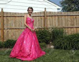 Girl Poses Outside In Her Beautiful Pink Prom Dress Stock Photo Picture And Royalty Free Image Image 20285305 Find & download free graphic resources for posing photoshoot. girl poses outside in her beautiful pink prom dress