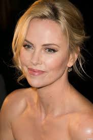 Charlize says every woman should shave her head at least once. She was very  beautiful in Road Worrior.