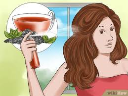 Twist hair, secure on top of head, and cover with a damp towel or shower cap. 3 Ways To Enhance Your Hair Color Using Tea Wikihow