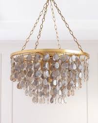 Candle chandeliers are designed to resemble candles, while cage chandeliers feature a light source surrounded by a metal, wire or wood cage. Madison Agate Chandelier In 2021 Wood Bead Chandelier Chandelier Chandelier Lighting