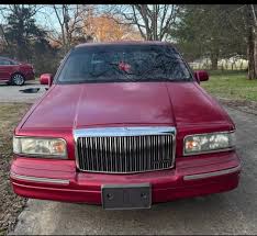 Image result for Electric Current Red 1995 Town Car