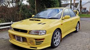 Image result for Herald Yellow 1976 Subaru