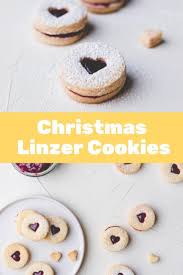 Delicious Vegan Linzer Cookies Filled With Raspberry Jam These Jam Sandwich Cookies Are One Of The Mos Weihnachtsrezepte Vegane Weihnachtsplatzchen Spitzbuben