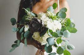 A Wild Organic Bridal Bouquet Filled With Silver Dollar Eucalyptus Succulents And Boho Wedding Bouquet Boho Wedding Bouquet Rustic Succulent Bridal Bouquets