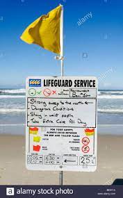 Lifeguard Warning Sign On The Beach Of Surfers Paradise Gold Coast Queensland Australia Stock Photo Surfers Paradise Lifeguard Beach