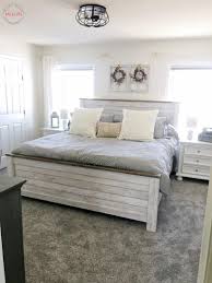 I also love how she tied in the black iron chandelier, this really brings the room accents together. Farmhouse Style Master Bedroom Makeover Using Hypoallergenic Carpet Alternative Air O Unified Soft Flooring Must Have Mom