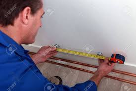 Maybe you would like to learn more about one of these? Plumber Measuring Length Of Copper Pipe Stock Photo Picture And Royalty Free Image Image 16951415