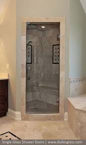 This Single Glass Shower Door Makes A Dramatic Statment With Gray Glass Which Offsets The Black Tiles In The Show Shower Doors Glass Shower Doors Glass Shower