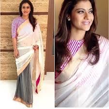 Black And White Striped Saree Blouse Everyone Need To Have A Stripe Blouse Striped Blouse Designs Blouse Design Models Trendy Blouse Designs