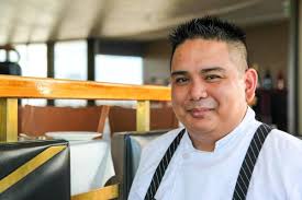 Executive Chef Michael McNeilly has a natural hunger for great food. As a  child, he loved to visit his grandparents because they let him help them in  the kitchen. At the age