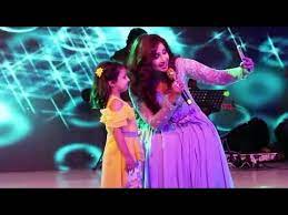 The picture features her and her husband shiladitya with their baby. Shreya Ghoshal With A Cute Child Youtube