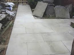 The irregular, jagged cuts and layout serve as a continuum of the surrounding rugged landscape. Large Paving Slabs Design Belezaa Decorations From Large Paving Slabs Ideas Pictures